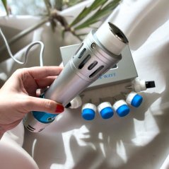 Electric massager with shock technology