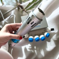 Electric massager with shock technology