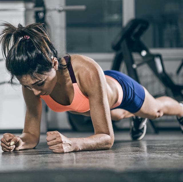 Woman exercising in a plank position